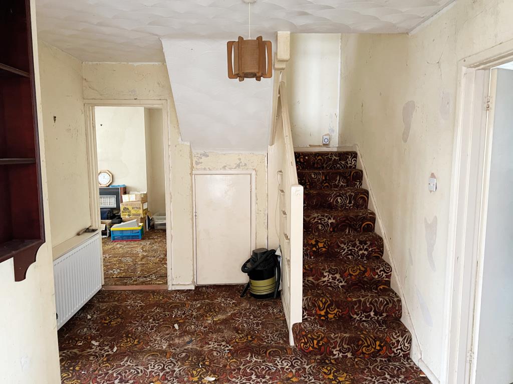 Lot: 139 - DETACHED THREE-BEDROOM CHALET BUNGALOW IN NEED OF IMPROVEMENT - Entrance hall with stairs to first floor